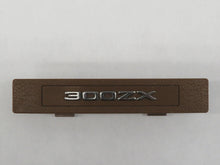 Laden Sie das Bild in den Galerie-Viewer, Nissan 300ZX Z31 Emblem Schriftzug Mittelkonsole braun